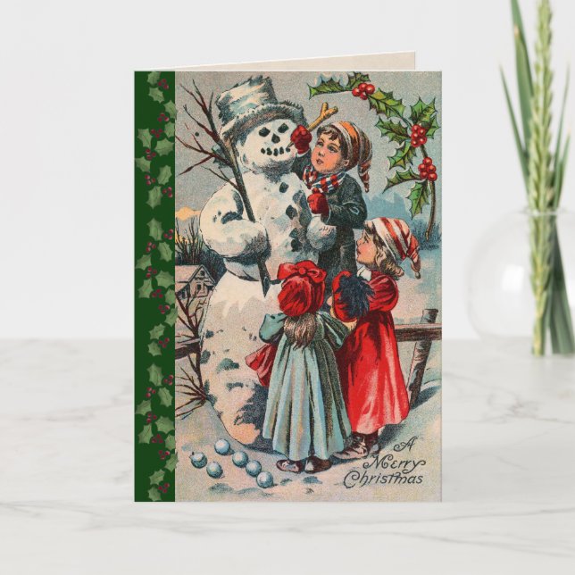 Tarjeta Festiva Niños victorianos construyen un muñeco de nieve (Anverso)