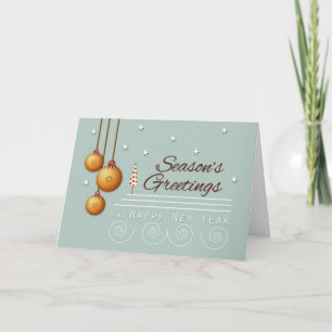 Tarjeta Festiva Ornamentos dorados en los saludos de la temporada