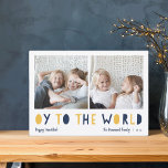 Tarjeta Festiva Oy to the World | 2 Foto Hanukkah<br><div class="desc">La fantástica tarjeta de fotos Hanukkah presenta dos de tus fotos familiares favoritas en un formato cuadrado alineado lado a lado. "Oy to the World" aparece debajo de la letra azul y dorada amarilla recortada. Personalice con su nombre o apellidos, el saludo de personalizados y el año a lo largo...</div>