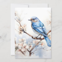 Pájaro azul de primavera en el árbol floreciente