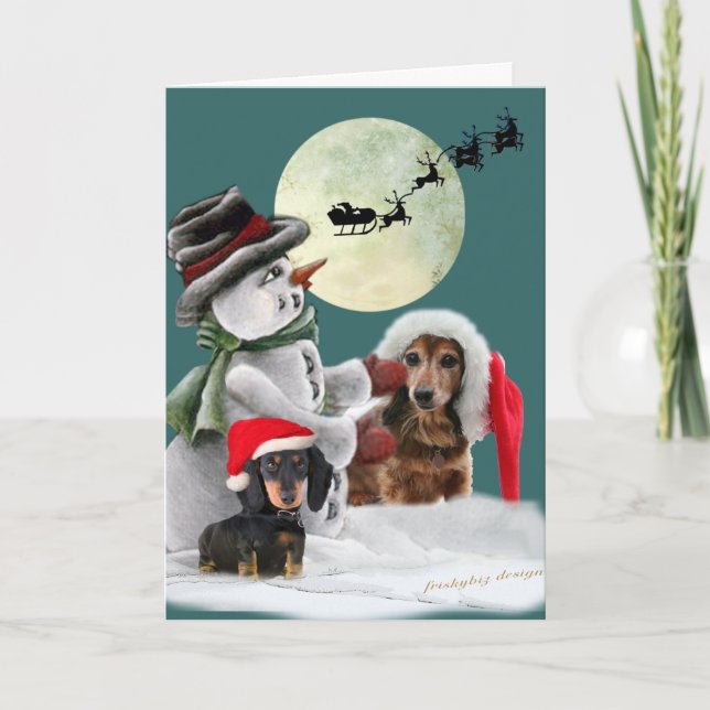 Tarjeta Festiva Pals de Dachshund posadas con nevadas (Anverso)