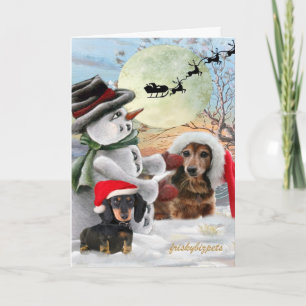 Tarjeta Festiva Pals de Dachshund posadas con nevadas