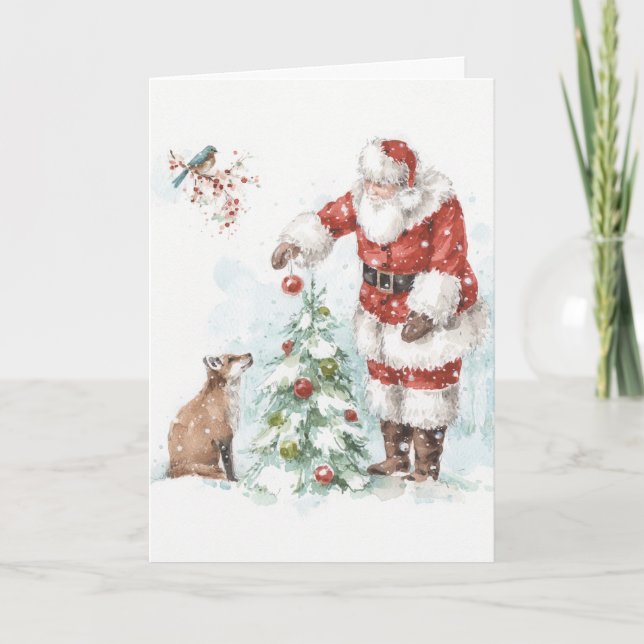 Tarjeta Festiva Papá Noel decorando un árbol con su bosque (Anverso)