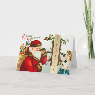 Tarjeta Festiva Papá Noel en los teléfonos de cuerdas escuchando a