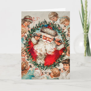 Tarjeta Festiva Papá Noel en teléfonos de cuerda escuchando a los