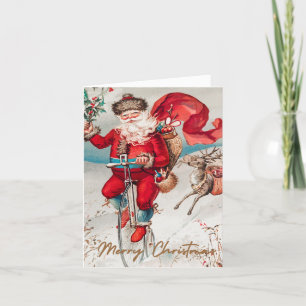 Tarjeta Festiva Papá Noel en una bicicleta penny farthing con reno