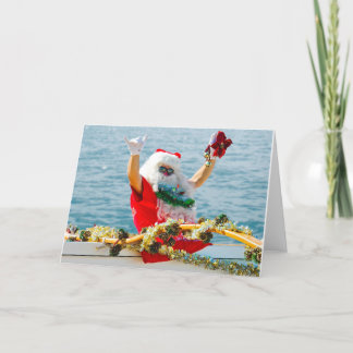 Tarjeta Festiva Papá Noel llega a una canoa