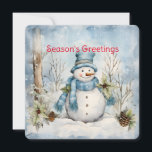 Tarjeta Festiva Pastel Blue Snowman Pine Cones Holly Winter Scene<br><div class="desc">Un delicado azul pastel se apodera de la escena del bosque invernal con un muñeco de nieve entre los pinos y un hueco en esta carta de Navidades que envía "Saludos de temporada". Personalizado en la parte posterior con su nombre un verso adecuado para las vacaciones.</div>