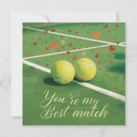Pelota de tenis con AMOR en cancha azul