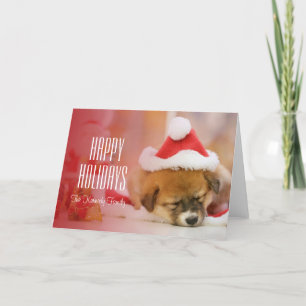 Tarjeta Festiva Perrito el dormir que lleva un gorra de Santa