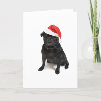 Tarjeta Festiva Perro de pug negro con sombrero de santa roja