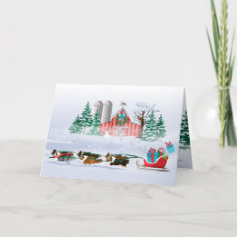 Tarjeta Festiva Perros marrones, negros y grises, saltando a Sleig