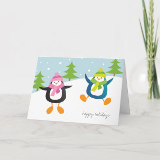 Tarjeta Festiva Pingüinos felices en nieve buenas fiestas