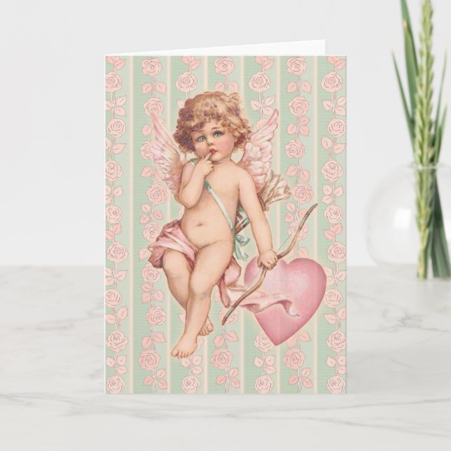 Tarjeta Festiva Pink Cupid sobre los Rosas (Anverso)