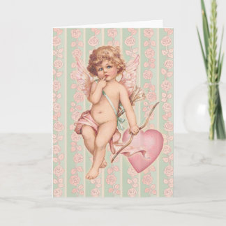 Tarjeta Festiva Pink Cupid sobre los Rosas