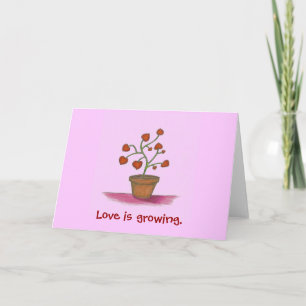 Tarjeta Festiva planta de amor, el amor está creciendo.