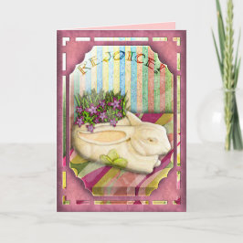 Tarjeta Festiva Plantador del conejito de pascua en ventana rosada