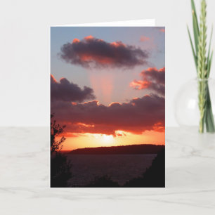 Tarjeta Festiva Puesta de sol sobre la bahía de St Aubin en Jersey
