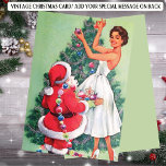 Tarjeta Festiva Retro Woman Santa Christmas Tree<br><div class="desc">Retroceda en el tiempo con esta deliciosa tarjeta de vacaciones de Navidades retro, capturando la alegría y el romanticismo de la temporada navideña. Cuenta con una elegante mujer decorando un Navidad con Santa Claus. Este diseño de inspiración de mediados de siglo evoca el glamour y la diversión de las fiestas...</div>