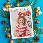 Tarjeta Festiva Ríe todo el camino Navidades de niños arcoiris<br><div class="desc">Hermosa y colorida tarjeta de Navidades de fotos con Laughing All the Way en escritura cursiva arcoiris bonito. Personaliza con tu fotografía de familia vertical favorita de tu hijo sonriente por encima de tu nombre o saludo personalizado en rojo. Divertidas y alegres tarjetas de vacaciones con una segunda foto completa...</div>