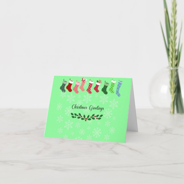 Tarjeta Festiva Saludos navideños con copos de nieve y medias (Anverso)