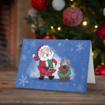 Tarjeta Festiva Santa Chocolate Lab Risa de Alegría de Alegría de<br><div class="desc">Esta es una gran tarjeta de Navidades para mandar a cualquiera a poner una sonrisa en su cara como la de Santa acá esta temporada de vacaciones. En la parte delantera de la tarjeta hay un ilustracion de Santa riendo mientras reacciona viendo a su laboratorio de chocolate usando una corona...</div>