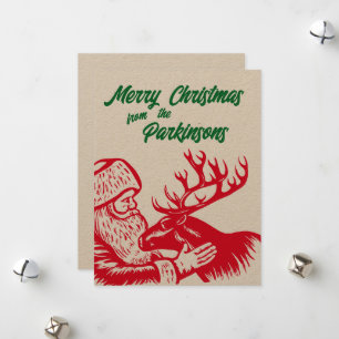 Tarjeta Festiva Santa Claus, el viejo rollo de madera y reno