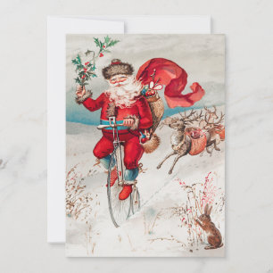 Tarjeta Festiva Santa Claus viajando en bicicleta, reno y conejo
