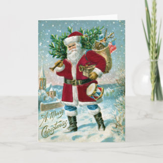 Tarjeta Festiva Santa en la nieve llevando tambor y árbol