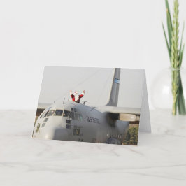 Tarjeta Festiva Santa obtiene algo de ayuda de un C-130