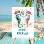 Tarjeta Festiva Seahorse Mistletoe Merry Kissmas Coastal Christmas<br><div class="desc">Share some love with this coastal Christmas card featuring watercolor seahorses in Santa hats kissing under mistletoe on the beach with a "Merry Kissmas" greeting. Visit my "Seahorse Coastal Christmas Kiss" collection for coordinating invitations,  party supplies,  decor and more. Art by KL Stock.</div>