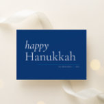 Tarjeta Festiva Serio simple azul Happy Hanukkah<br><div class="desc">La simplicidad moderna hace que esta carta de vacaciones subestimada basada en texto brille en los clásicos colores de Hanukkah azul y blanco. El personalizado backer presenta dos de sus mejores fotos del año y texto de mensaje fácil de personalizar.</div>