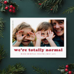 Tarjeta Festiva Somos Navidades de fotografía familiar divertida y<br><div class="desc">Captura la alegría y el humor de la temporada con esta lúgubre tarjeta de Navidades "Somos totalmente normales". Con una foto franca de la familia, este diseño abarca los momentos graciosos y tontos que hacen única a tu familia. El texto rojo moderno y la disposición sencilla ofrecen un toque encantador...</div>