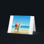 Tarjeta Festiva Surf Santa on the beach<br><div class="desc">Summer Santa in beach wear,  long board shorts or Bermuda shorts and flip-flop sandals,  holding a surfboard on a sunny beach.</div>