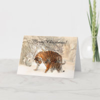 Tigre bebé y madre tigre en un bosque nevado