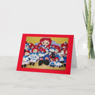 TARJETA FESTIVA "TODOS LE DESEAMOS UNA FELIZ NAVIDAD" RAGGEDYANN