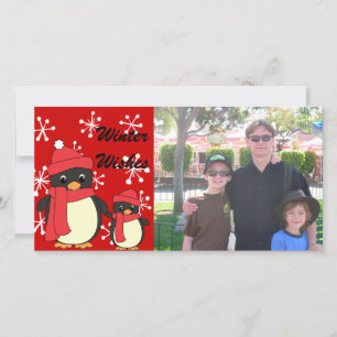 Tarjeta Festiva Tomando un pequeño pingüino para caminar