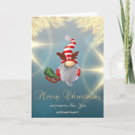 Tarjeta Festiva Trineo de duende nórdico ramas de pino doradas  
