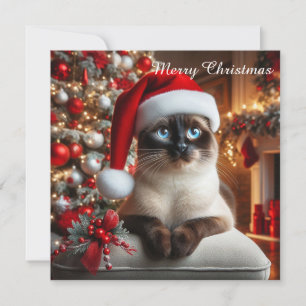 Tarjeta Festiva Un gato siamés lleva un sombrero de Santa
