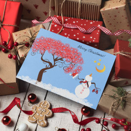 Tarjeta Festiva Un hombre de nieve con cara a la luna