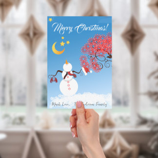 Tarjeta Festiva Un hombre de nieve con cara a la luna