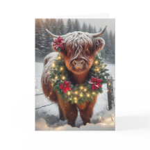 Vaca Highland de navidades con guirnalda