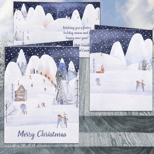 Tarjeta Festiva Vacaciones de invierno en una aldea de montaña rus (Snowy Mountain Ski Village Holiday Merry Christmas Wraparound Graphics Inside Folded Card)
