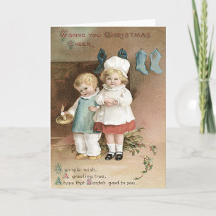 Tarjeta Festiva Vela del acebo de las medias de los niños