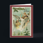 Tarjeta Festiva Vintage Merry Christmas Angels<br><div class="desc">En esta tarjeta de saludo aparece una imagen dulce y vintage de ángeles que desean "Una Feliz Navidad". En el interior de la tarjeta se lee: "¡Que las bendiciones de los Navidades llenen su corazón y su hogar con alegría!" ¡Una tarjeta encantadora para enviar a la familia y amigos para...</div>