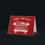 Tarjeta Festiva Vintage Red White Truck Merry Christmas Snow<br><div class="desc">Esta tarjeta de vacaciones personalizada incluye un ilustracion de un camión vintage con un árbol de Navidad en la parte trasera en un paisaje de pinos. Personalizar tu nombre y año en la parte trasera del camión. Dentro de la tarjeta hay un mensaje personalizado con su firma. Diseñado por la...</div>