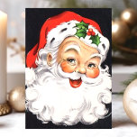 Tarjeta Festiva Vintage Santa Claus Face Navidades<br><div class="desc">Vintage Santa Claus Face Navidad tarjeta de vacaciones. Este diseño presenta un Santa Claus sonriente sobre un fondo negro. Qué hermosa escena de vacaciones retro. Personalice este diseño personalizado con su propio saludo interno.</div>