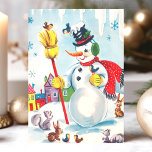 Tarjeta Festiva Vintage Snowman con Navidades de animales<br><div class="desc">Celebre la temporada de fiestas con esta encantadora tarjeta de Navidad vintage con un alegre muñeco de nieve rodeado de adorables animales. La escena es caprichosa e incluye pájaros, ardillas y un conejo, todo ello rodeado de un colorido pueblo de invierno. Esta nostálgica tarjeta de vacaciones captura la magia e...</div>