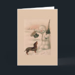 Tarjeta Festiva Vintage - Snowman saluda a un Dachshund,<br><div class="desc">Un ilustracion vintage de un muñeco de nieve metiendo su sombrero de punta y doblando la cabeza en saludo a un perro de Dachshund que se le ha acercado en un día de invierno nevado.  Esta tarjeta está en blanco dentro para su propio mensaje.</div>