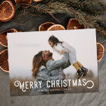 Tarjeta Festiva Vintage Typography and Oranges Merry Christmas<br><div class="desc">This beautiful holiday photo card features vintage styled typography reading, "Merry Christmas." The back of the card contains a vintage design of winter oranges and blossoms. A dark gradient photo overlay on the front of the card allows the white text to stand out against your photo - the size and...</div>